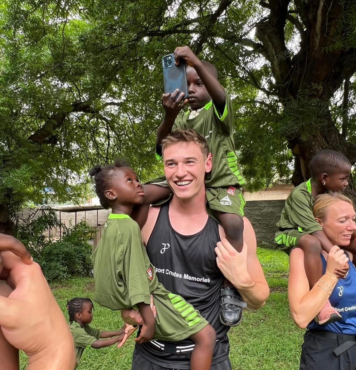Co-Founder with young players in Kenya
